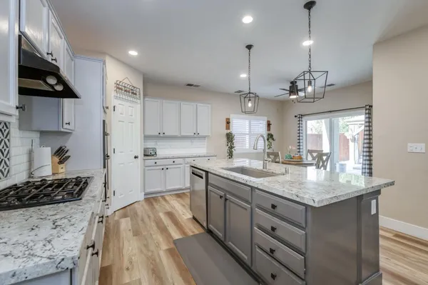 a bedroom with a bed and a television