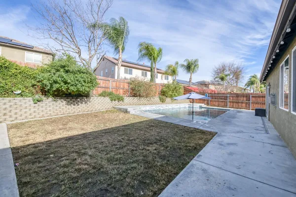 a front view of a house having yard