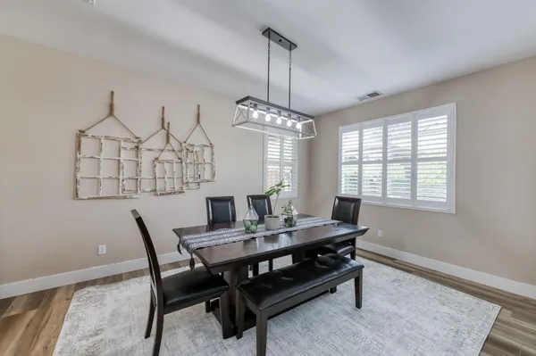 a view of a dining room with furniture