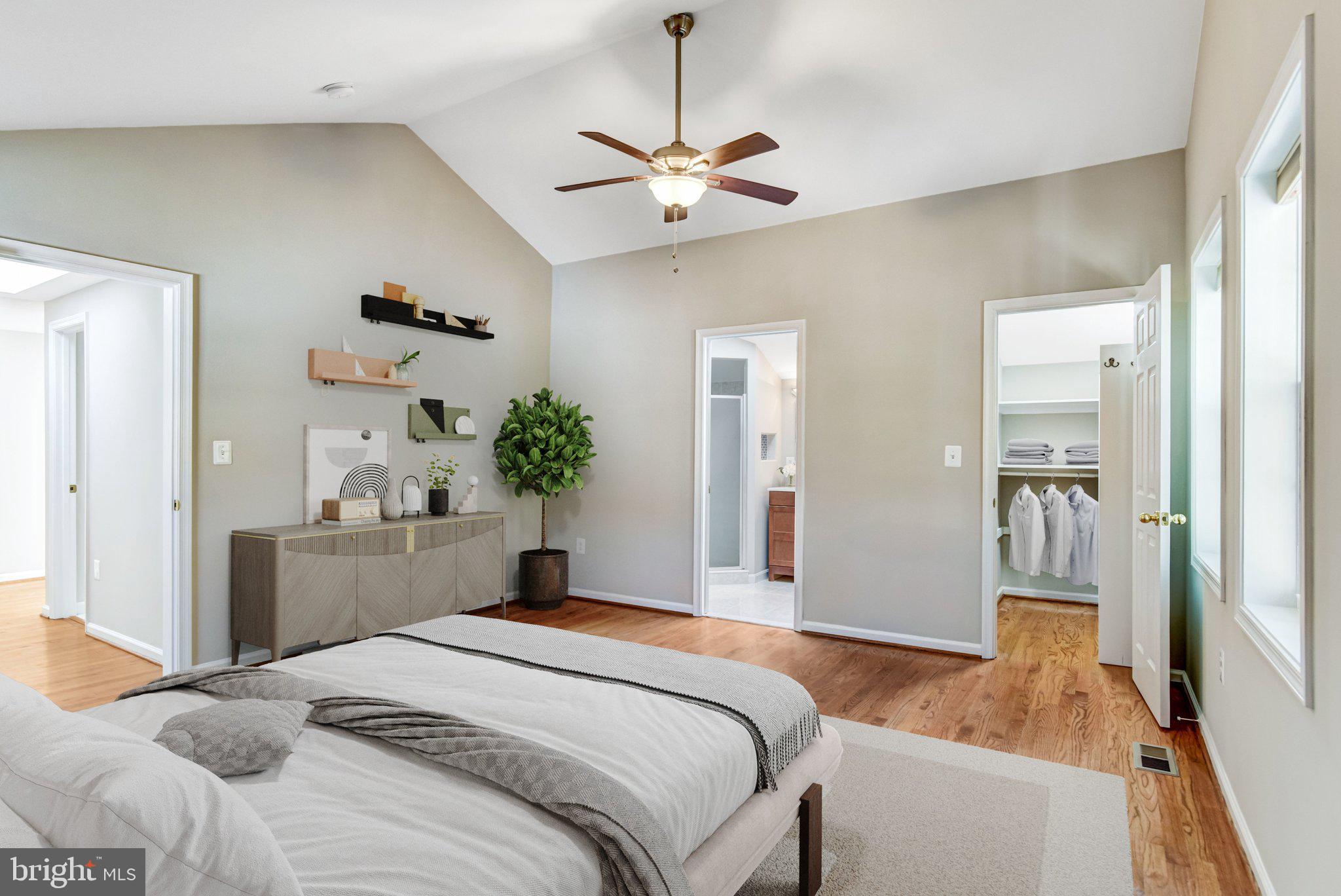 9720 Five Oaks Road Fairfax, VA 22031 - Photo 14 of 91 a bedroom with a bed and a chandelier