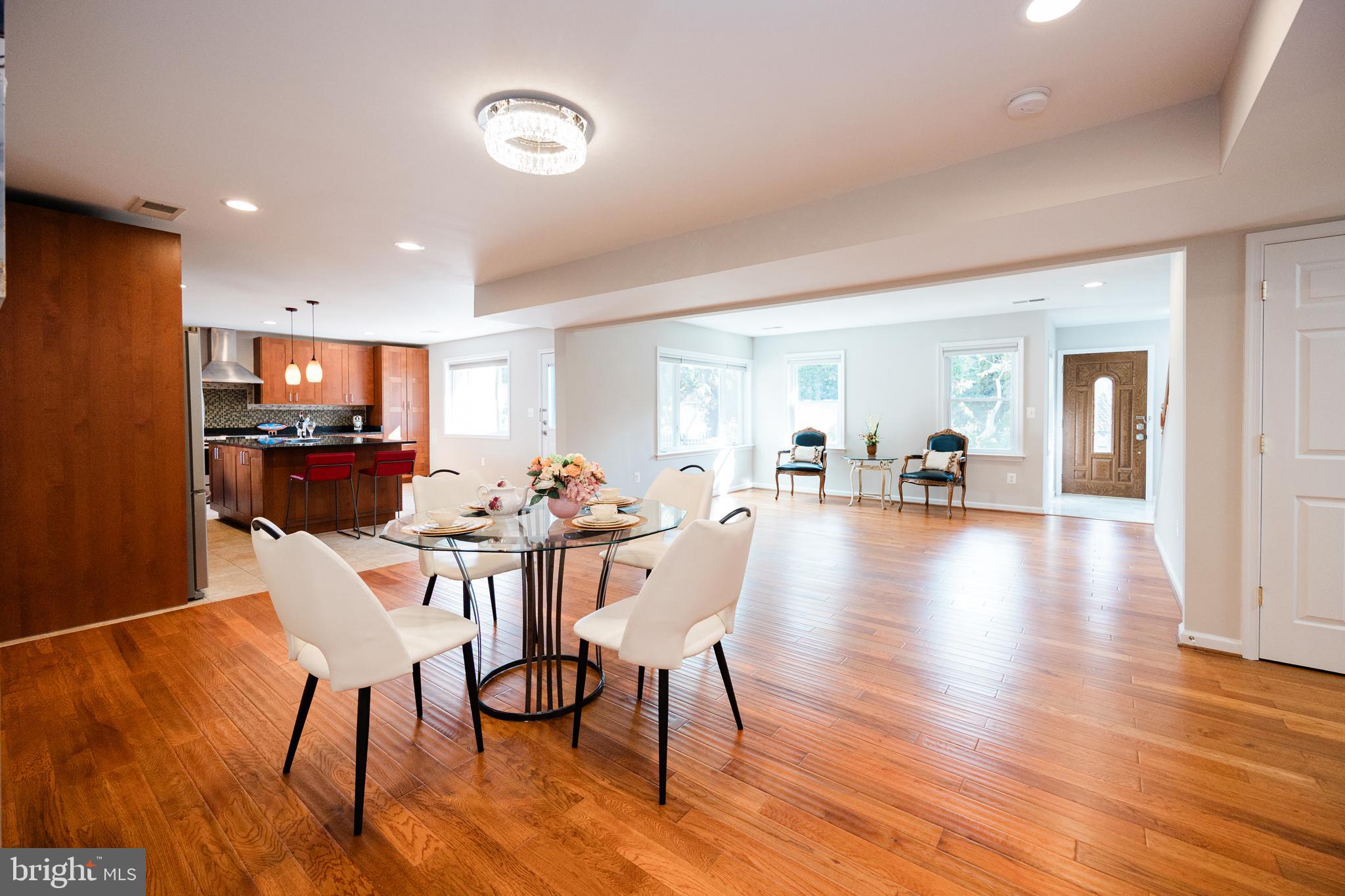 9720 Five Oaks Road Fairfax, VA 22031 - Photo 28 of 91 a view of a dining room with furniture and wooden floor