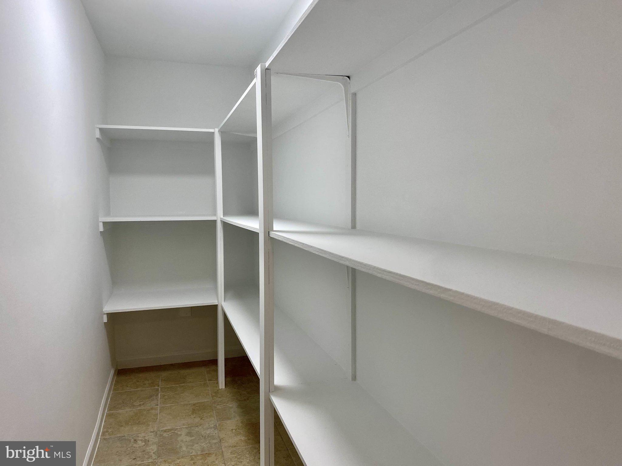 9720 Five Oaks Road Fairfax, VA 22031 - Photo 35 of 91 a view of an empty walk in closet