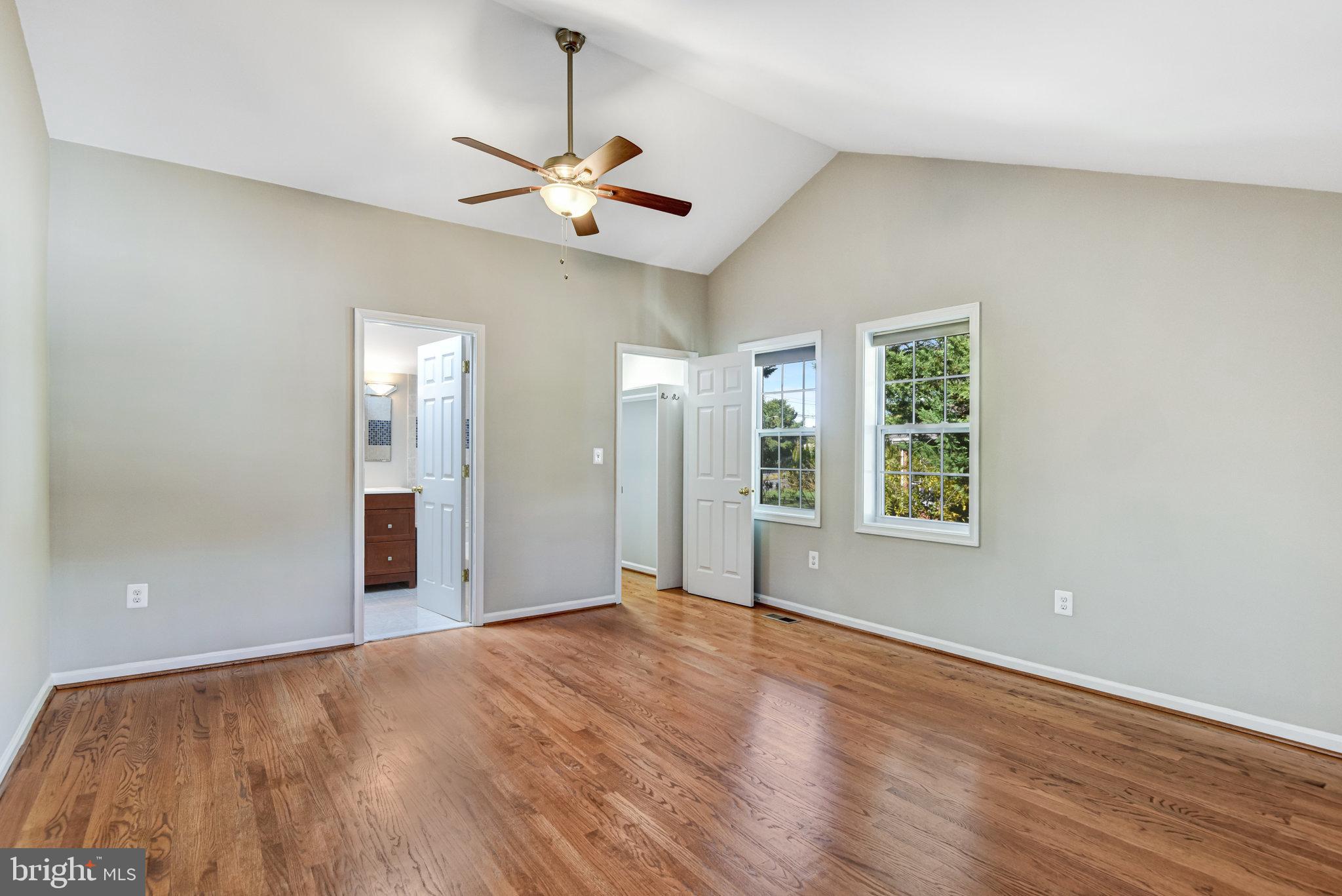 9720 Five Oaks Road Fairfax, VA 22031 - Photo 53 of 91 a view of an empty room with window and wooden floor
