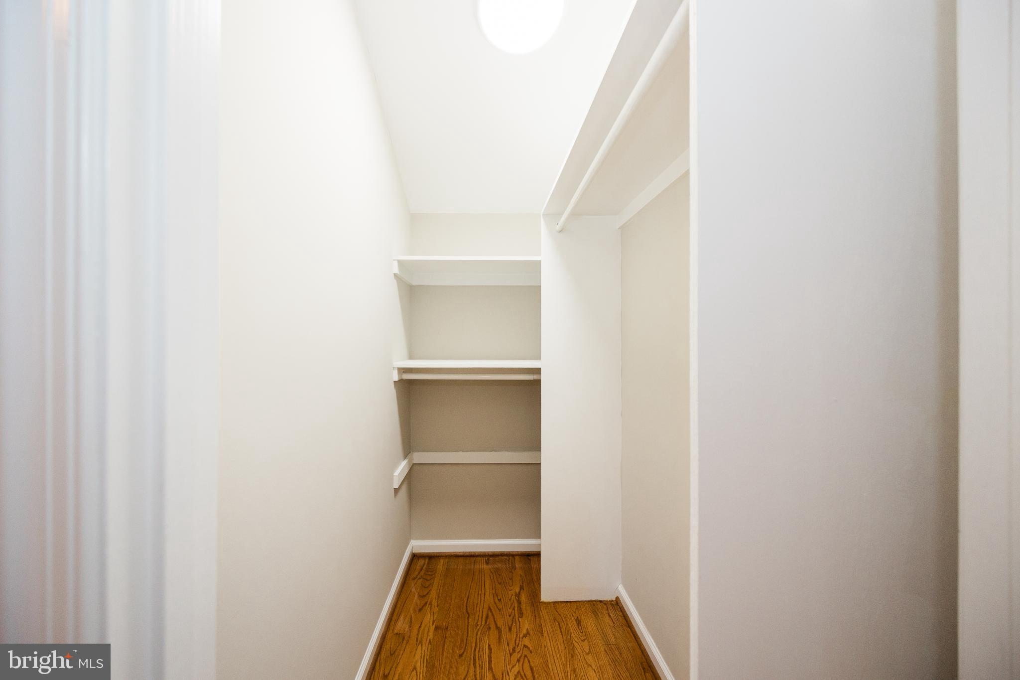 9720 Five Oaks Road Fairfax, VA 22031 - Photo 54 of 91 a view of a hallway with wooden floor and entryway