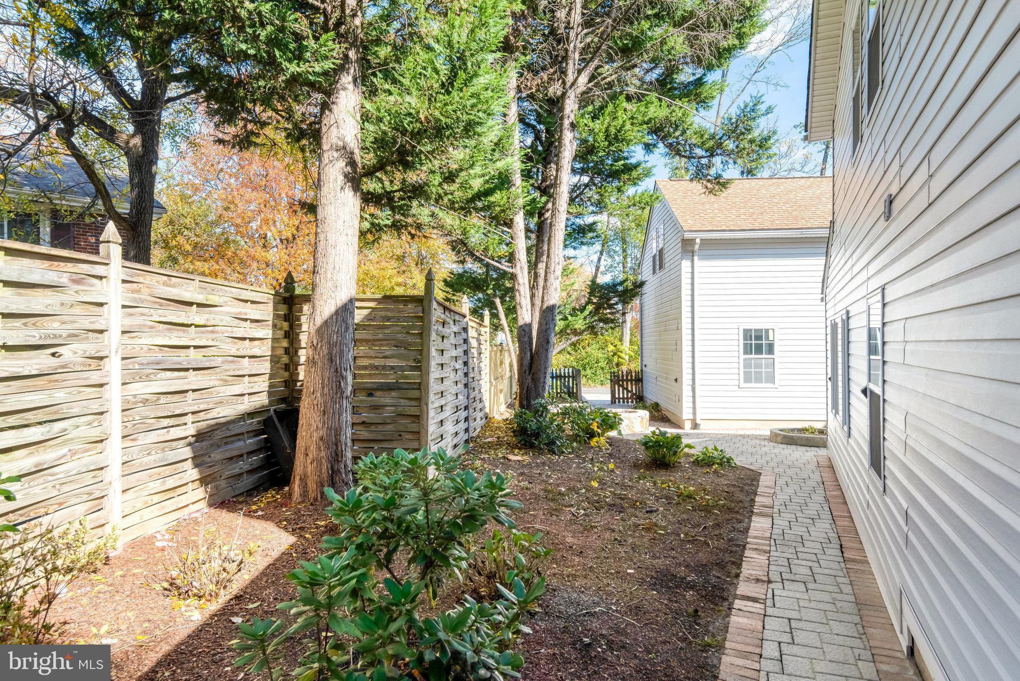 9720 Five Oaks Road Fairfax, VA 22031 - Photo 86 of 91 Paved walkway around the house