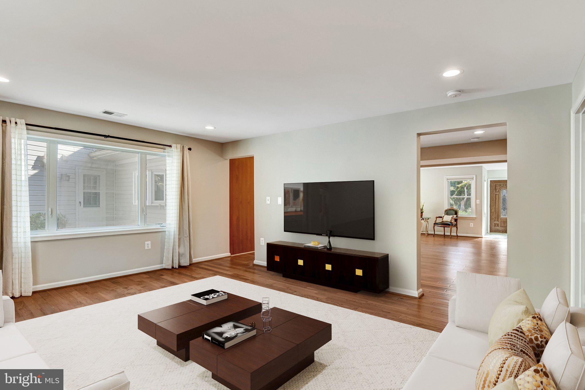 9720 Five Oaks Road Fairfax, VA 22031 - Photo 9 of 91 a living room with furniture and a flat screen tv