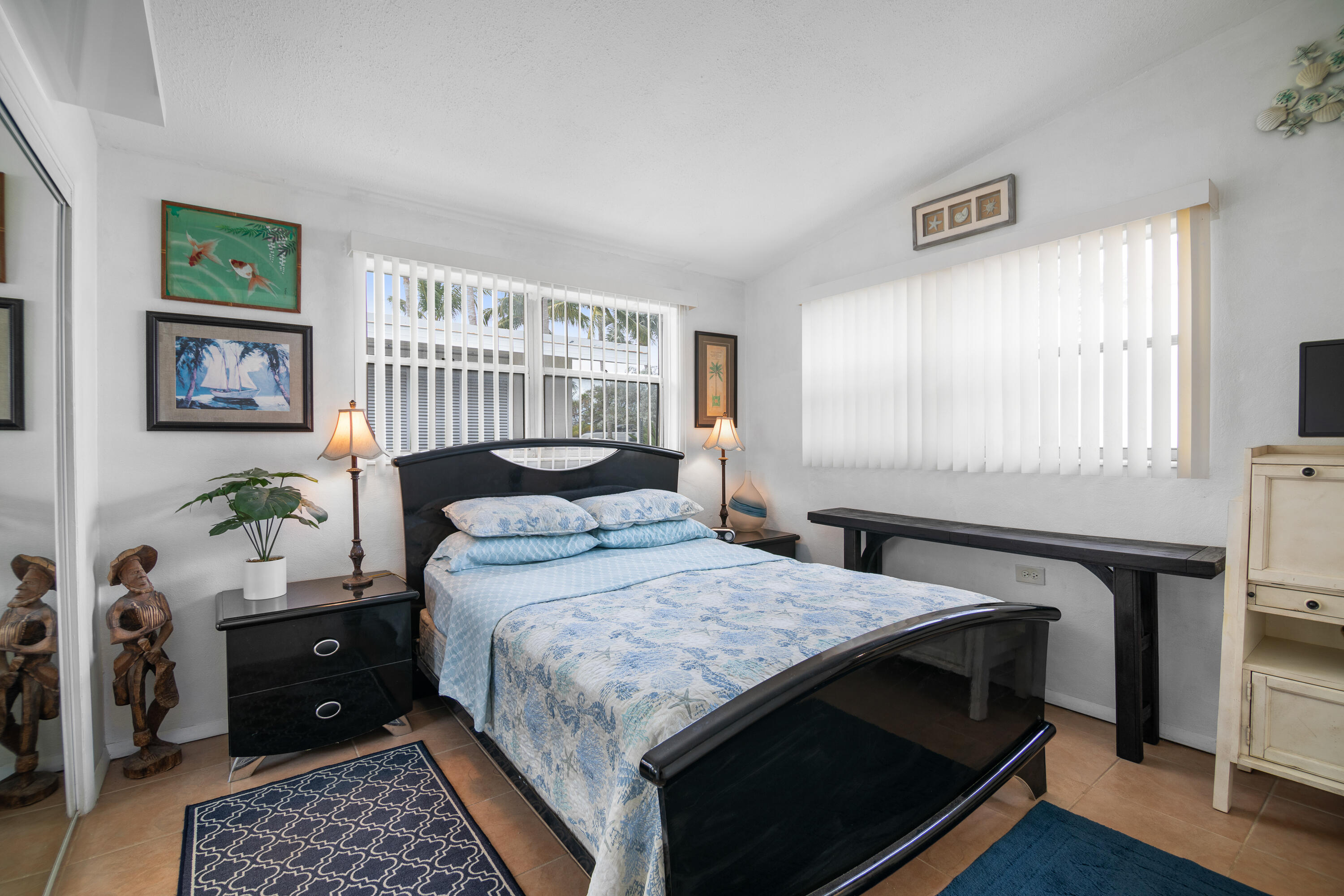 10 Clara Boulevard Marathon, FL 33051 - Photo 13 of 39 a bedroom with a bed and a window