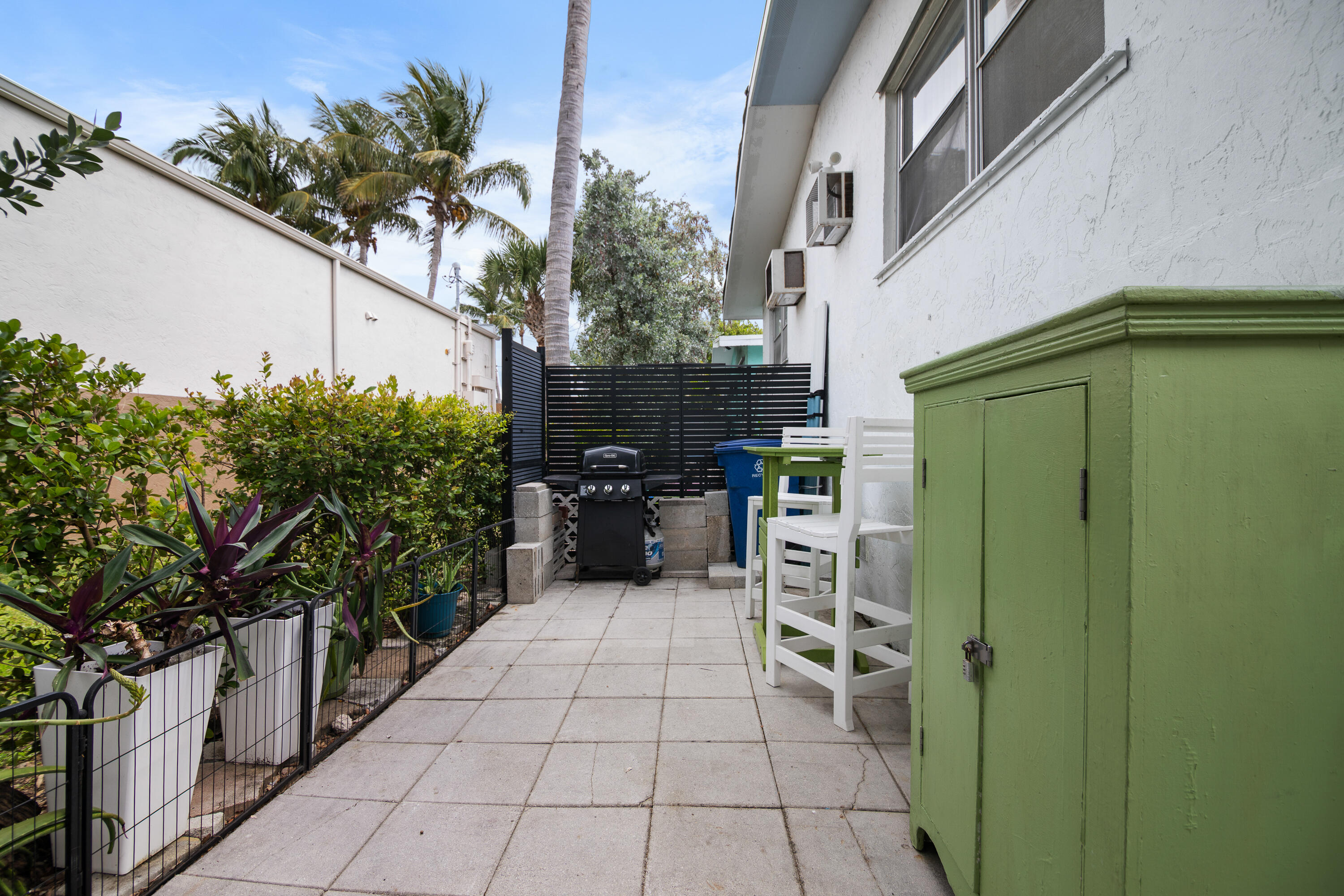10 Clara Boulevard Marathon, FL 33051 - Photo 30 of 39 a backyard of a house with plants and entertaining space