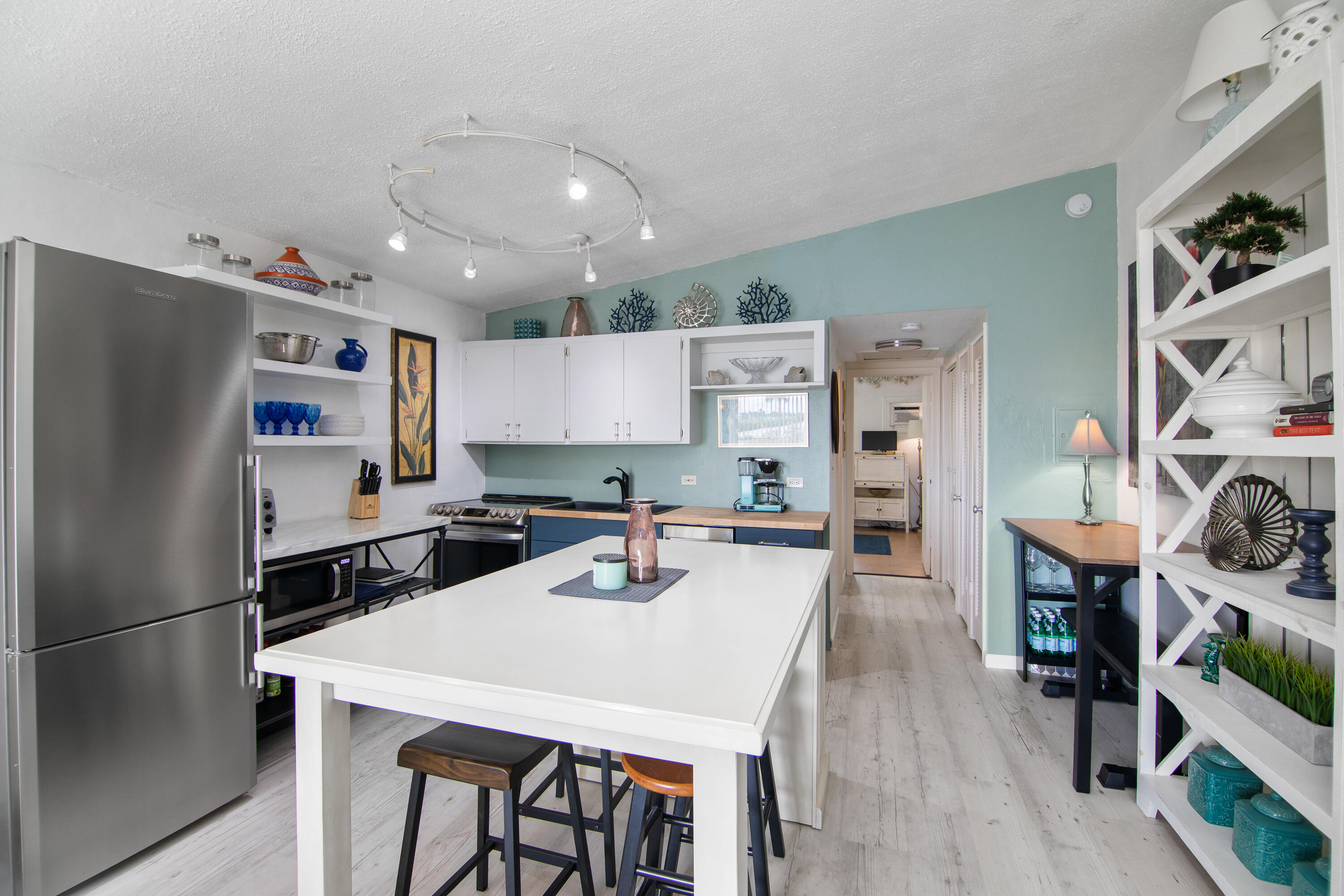 10 Clara Boulevard Marathon, FL 33051 - Photo 7 of 39 a kitchen with stainless steel appliances a table chairs and a refrigerator