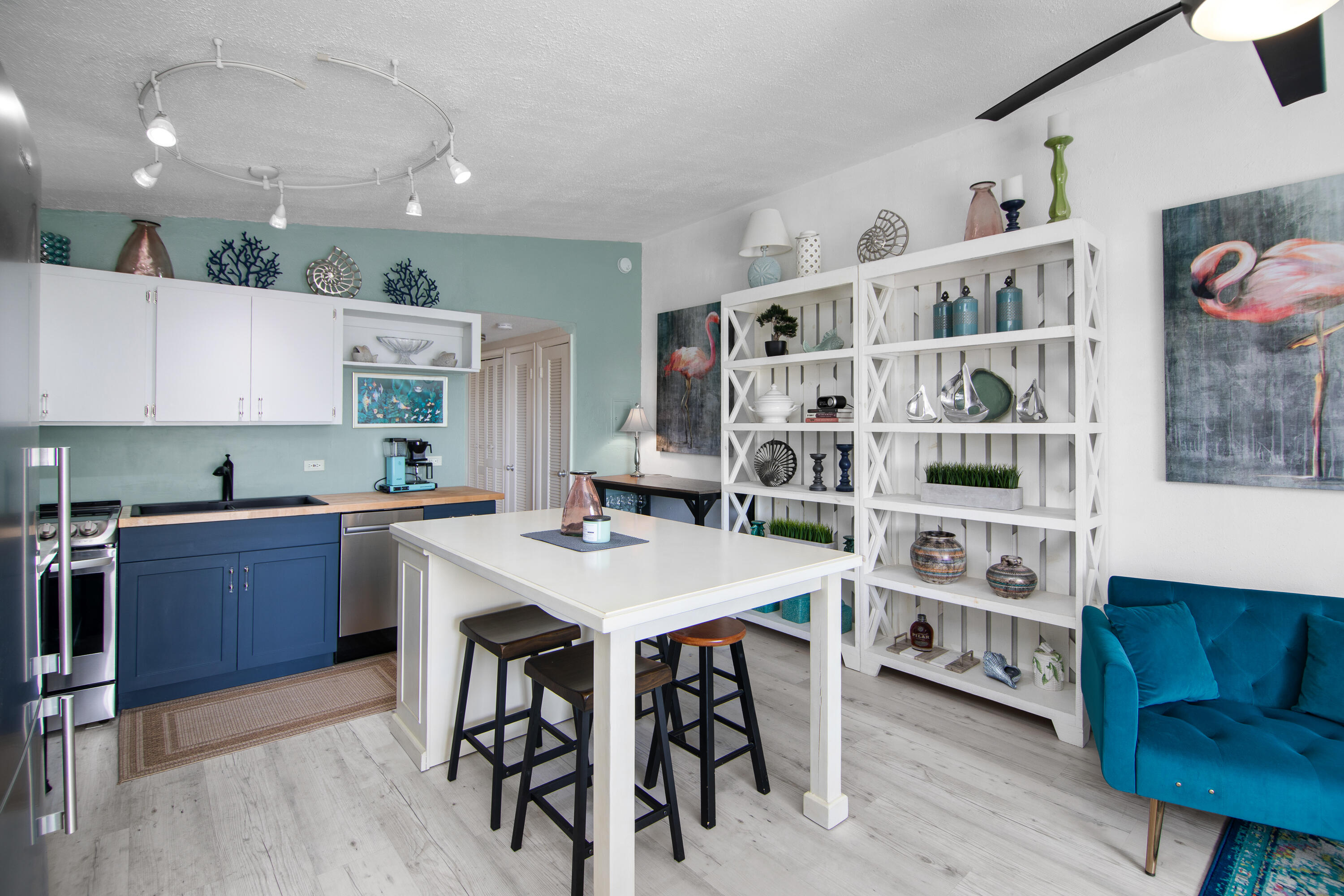 10 Clara Boulevard Marathon, FL 33051 - Photo 8 of 39 a kitchen with stainless steel appliances granite countertop a table chairs stove and cabinets