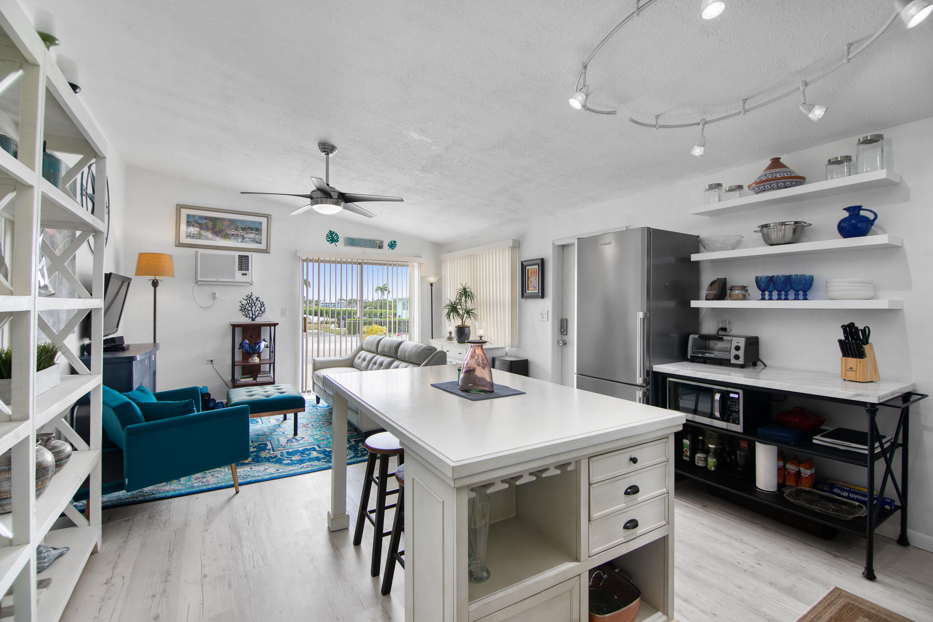 10 Clara Boulevard Marathon, FL 33051 - Photo 9 of 39 a kitchen that has a table chairs and wooden floor