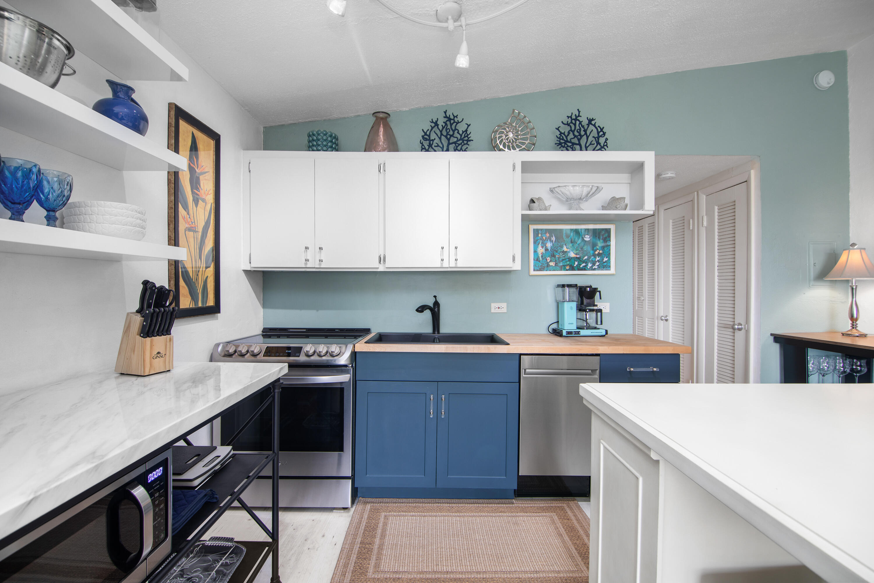 10 Clara Boulevard Marathon, FL 33051 - Photo 10 of 39 a kitchen with a sink a stove and cabinets