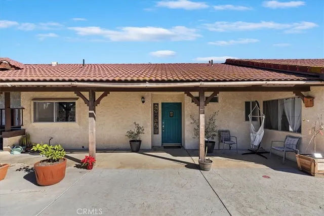 a view of a porch with furniture