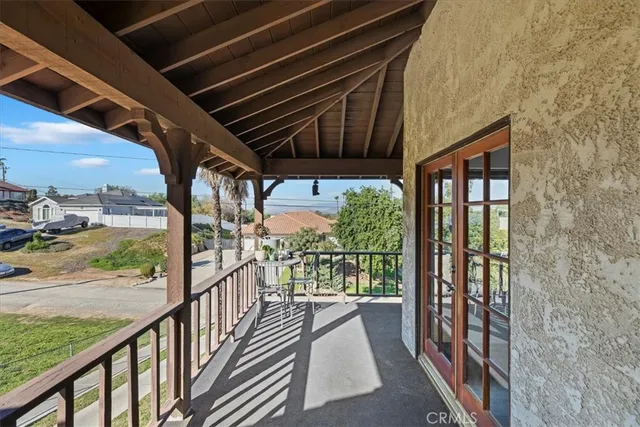 a view of a city with lush green forest