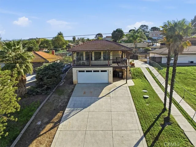 an aerial view of a house with garden