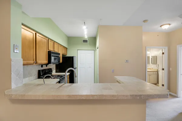 $269,900 | 2309 Myrtlewood Circle East, Unit 2309, Palm Beach Gardens, FL 33418