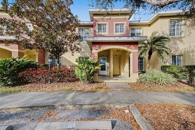 a room with furniture and wooden floor