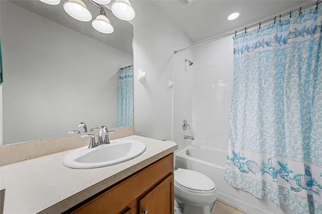 a view of storage and utility room with racks on the wall