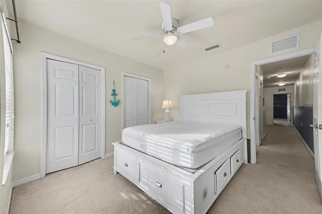 a view of a livingroom with chairs
