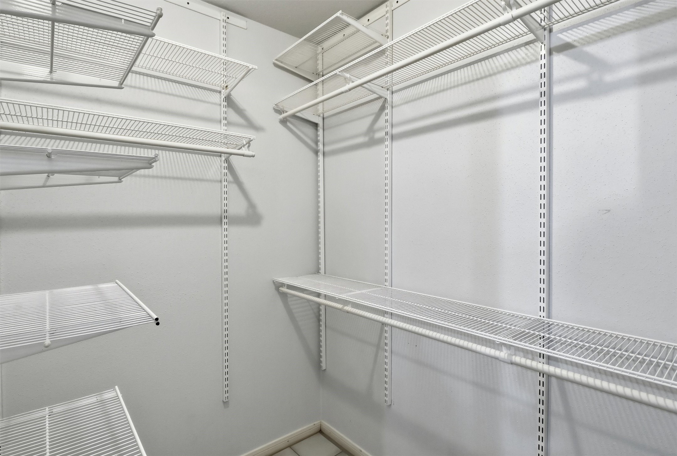 22923 Tomball Cemetery Road Tomball, TX 77377 - Photo 24 of 50 View of one of the closets in the primary bathroom with custom built in system.
