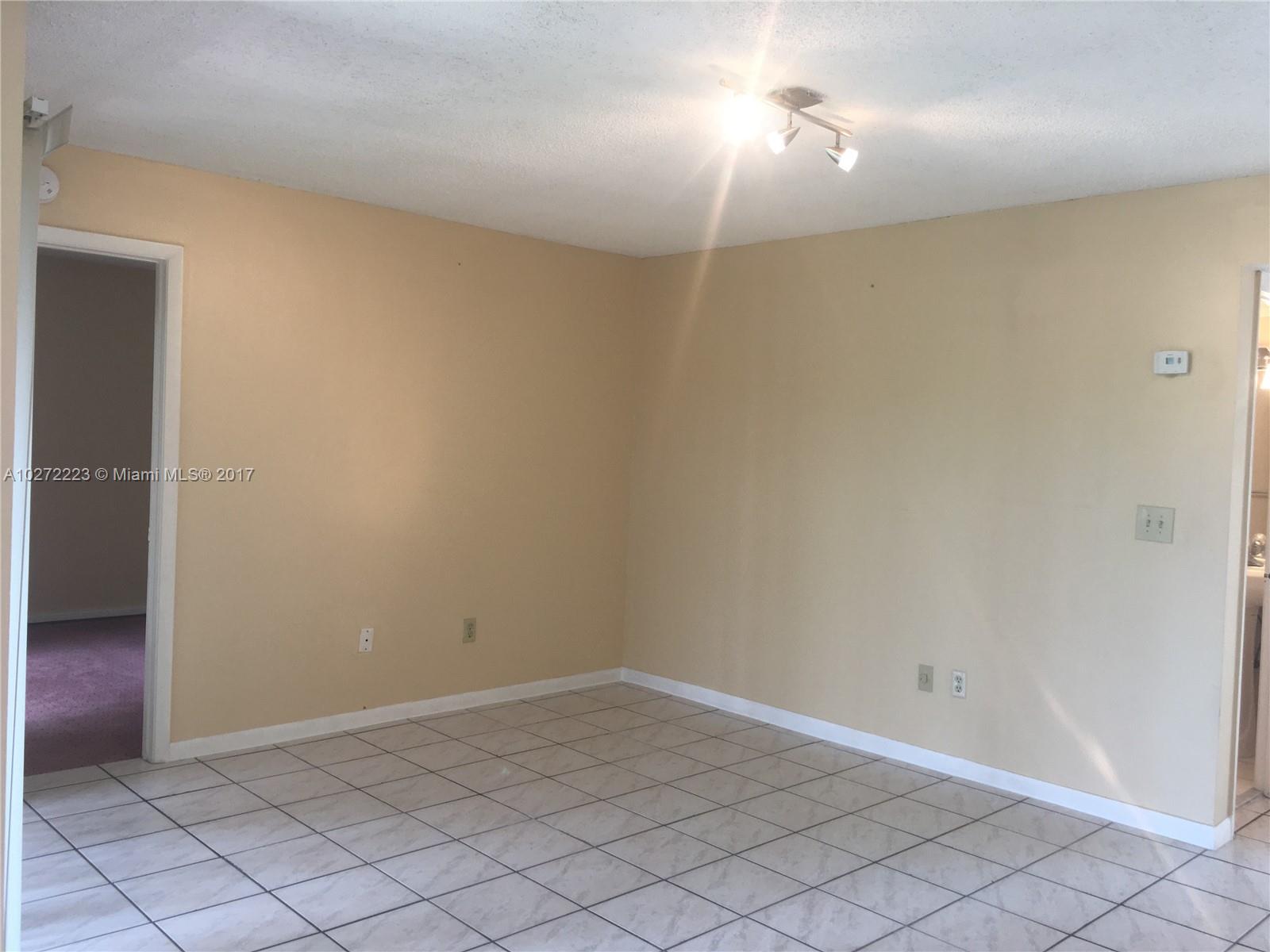 1071 Adams Avenue, Unit 1071F Homestead, FL 33034 - Photo 11 of 18 a view of an empty room