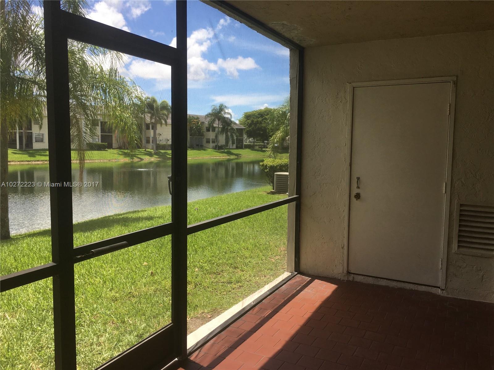 1071 Adams Avenue, Unit 1071F Homestead, FL 33034 - Photo 9 of 18 a view of lake from window