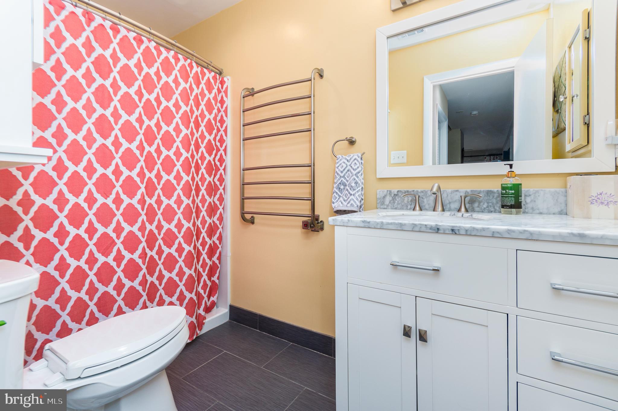 11610 Newbridge Court Reston, VA 20191 - Photo 16 of 21 Heated towel rack in basement bath conveys