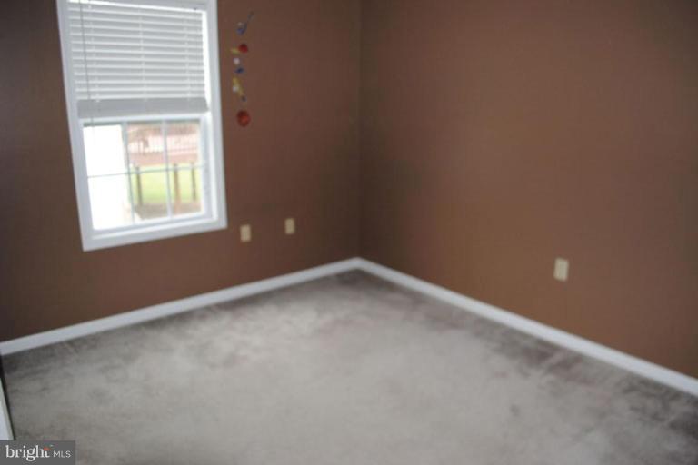 440 Ford Circle Inwood, WV 25428 - Photo 7 of 8 a view of an empty room with a window