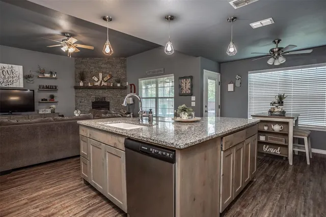 a kitchen with lots of counter space and a sink