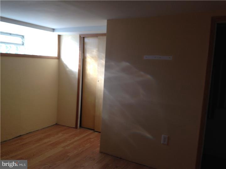 6316 Jackson Street Philadelphia, PA 19135 - Photo 11 of 14 a view of an empty room and window