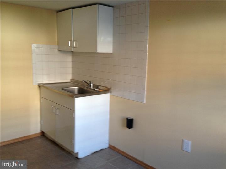 6316 Jackson Street Philadelphia, PA 19135 - Photo 14 of 14 a utility room with dryer and washer