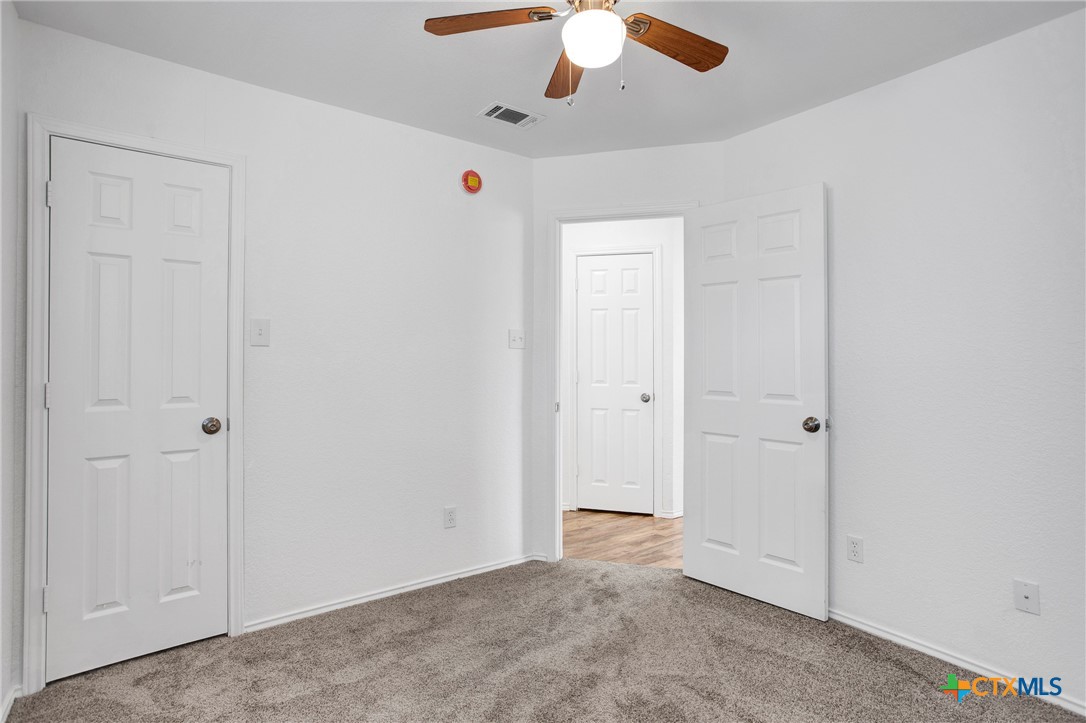 2010 Wright Way Killeen, TX 76543 - Photo 15 of 27 an empty room with chandelier fan