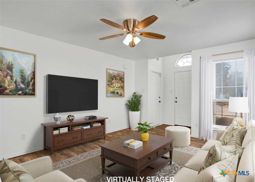 2010 Wright Way Killeen, TX 76543 - Photo 5 of 27 a living room with furniture and a flat screen tv
