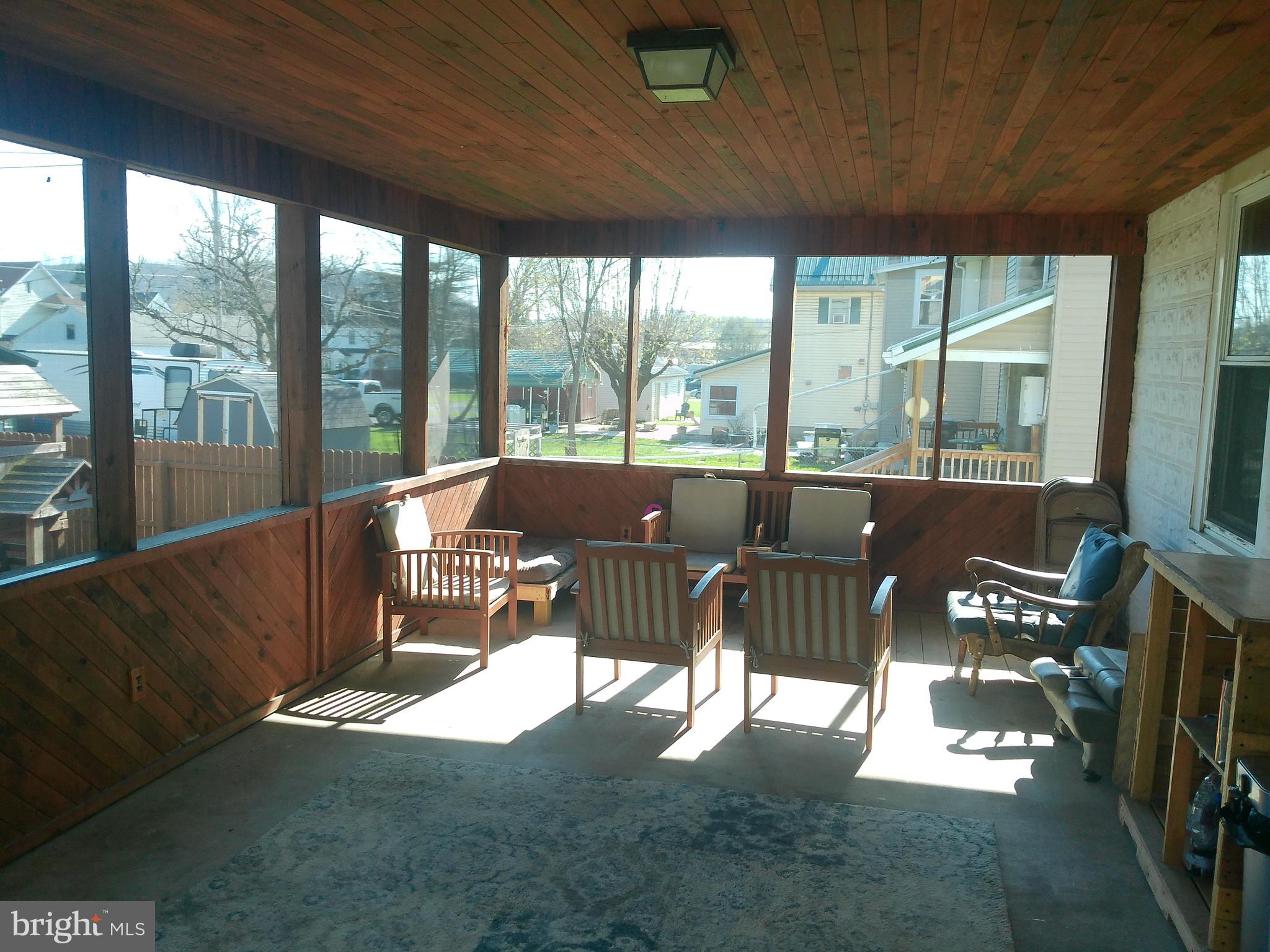 210 5th Avenue Burnham, PA 17009 - Photo 9 of 34 Rear screened porch