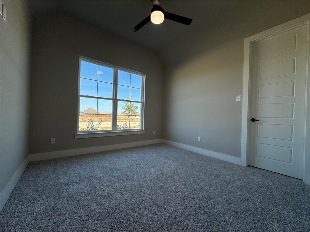129 Mikasi Street Godley, TX 76044 - Photo 18 of 21 an empty room with windows and natural light