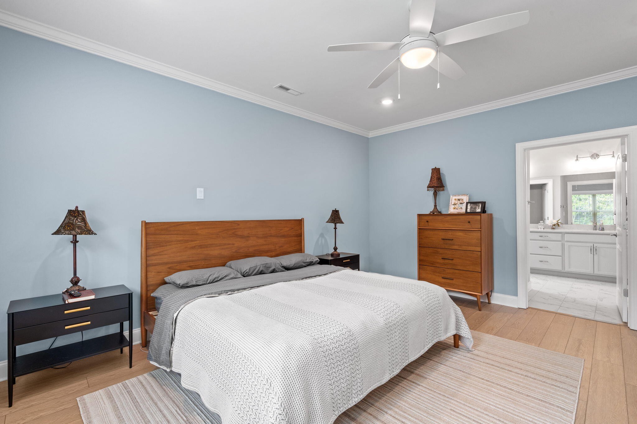 3144 Destination Trail Northwest Cleveland, TN 37312 - Photo 12 of 33 a bedroom with a bed and a chandelier