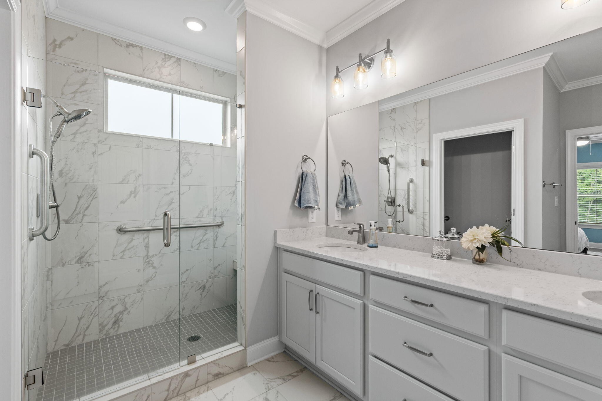 3144 Destination Trail Northwest Cleveland, TN 37312 - Photo 14 of 33 a bathroom with a double vanity sink mirror and shower