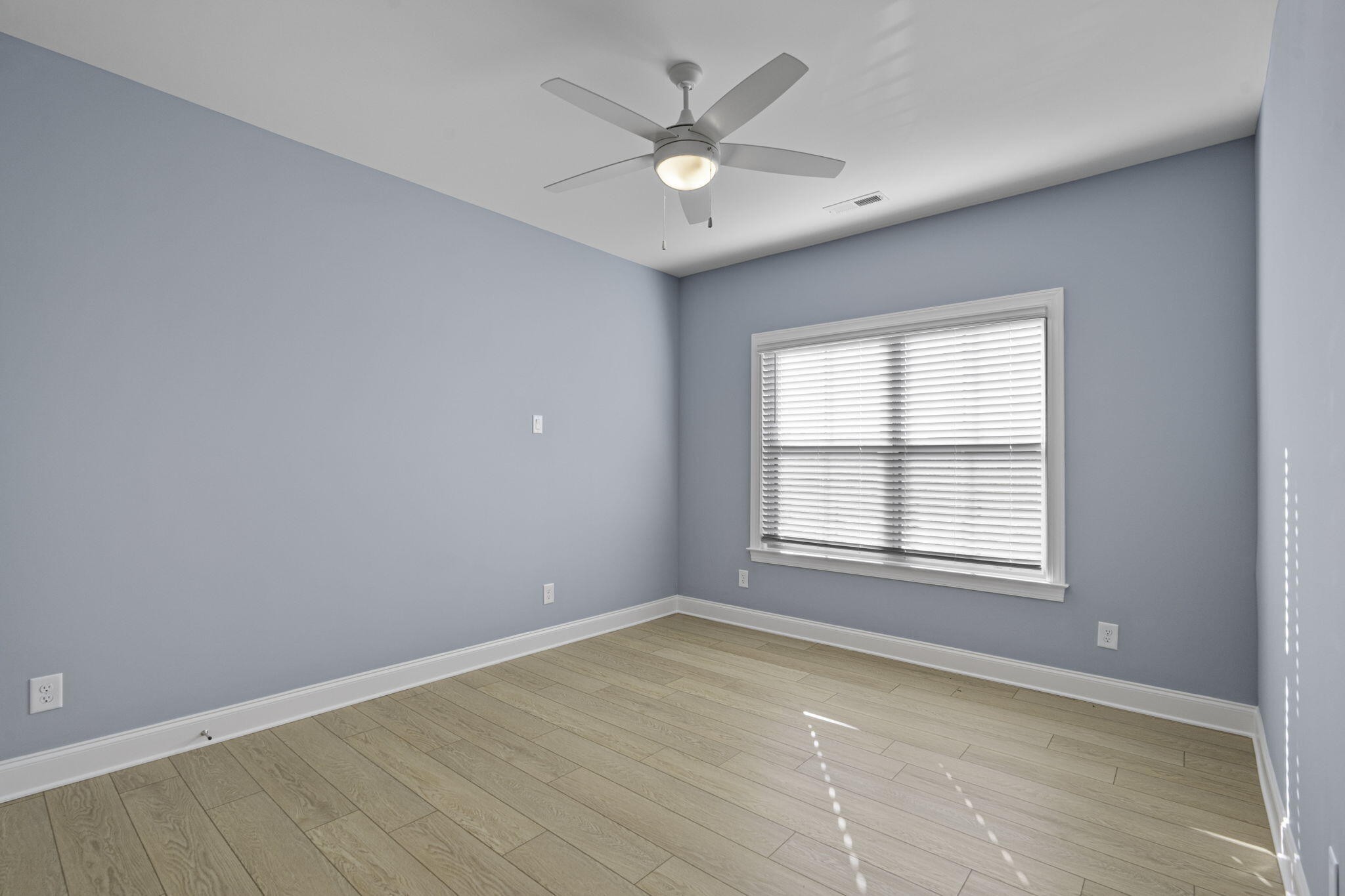 3144 Destination Trail Northwest Cleveland, TN 37312 - Photo 21 of 33 an empty room with a window and a ceiling fan