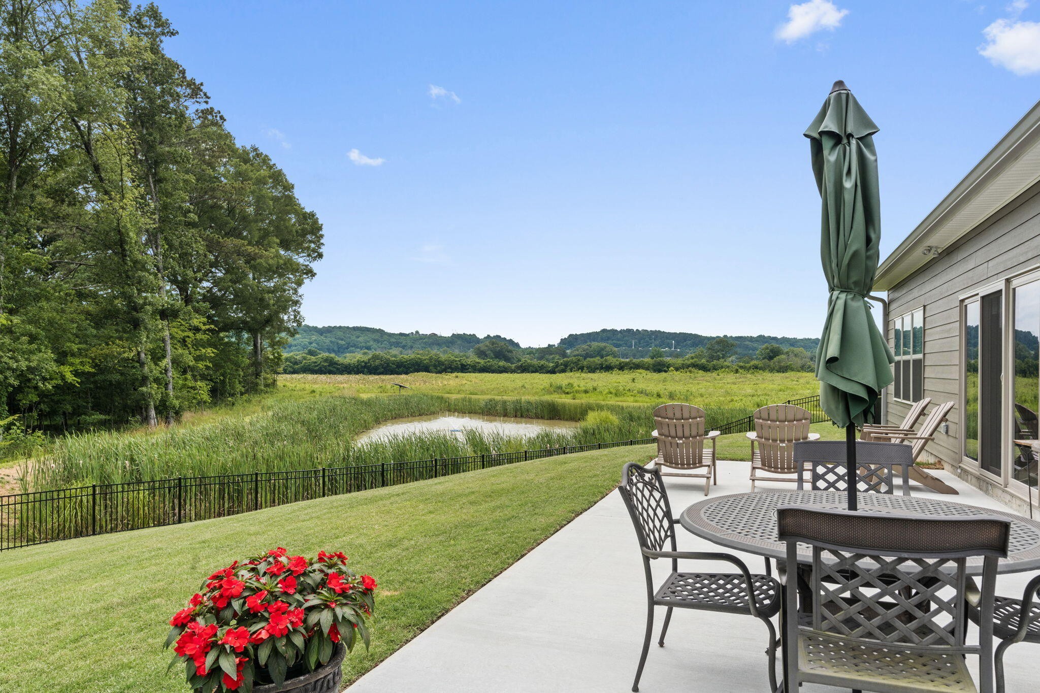 3144 Destination Trail Northwest Cleveland, TN 37312 - Photo 28 of 33 a view of a chairs and table in the river
