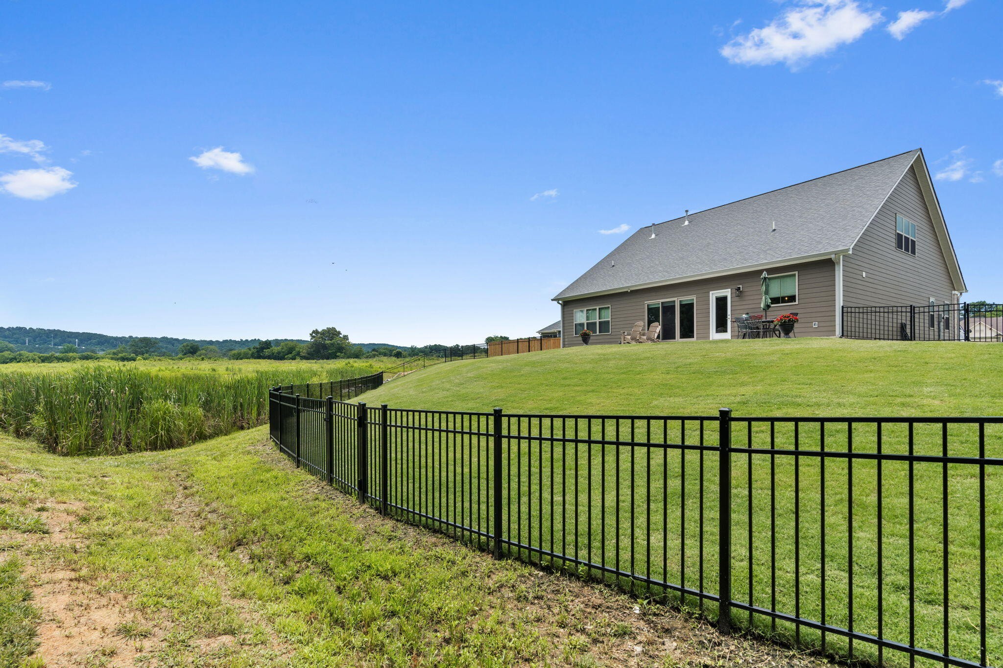 3144 Destination Trail Northwest Cleveland, TN 37312 - Photo 31 of 33 a view of a house with backyard