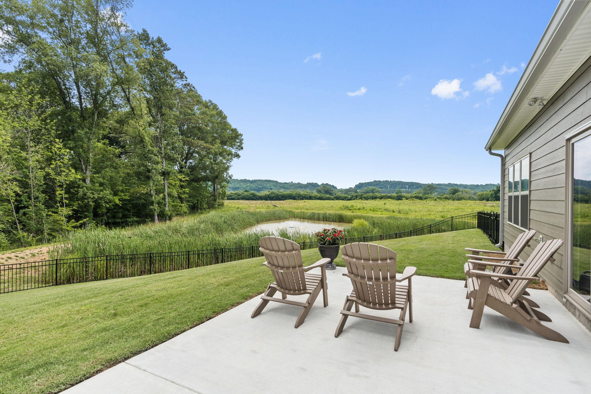 3144 Destination Trail Northwest Cleveland, TN 37312 - Photo 32 of 33 a view of a chairs and table in the garden