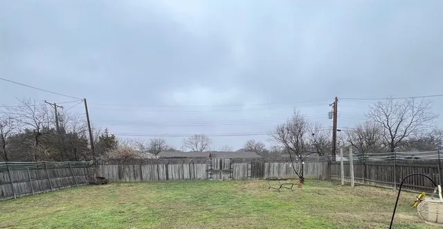 a close view of a stove top oven and cabinets