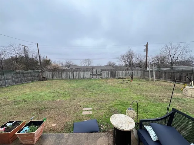 a view of a lake with a big yard