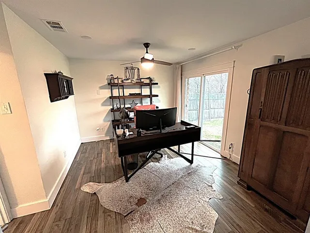 a kitchen with stainless steel appliances granite countertop a refrigerator a stove top oven a sink dishwasher and white cabinets