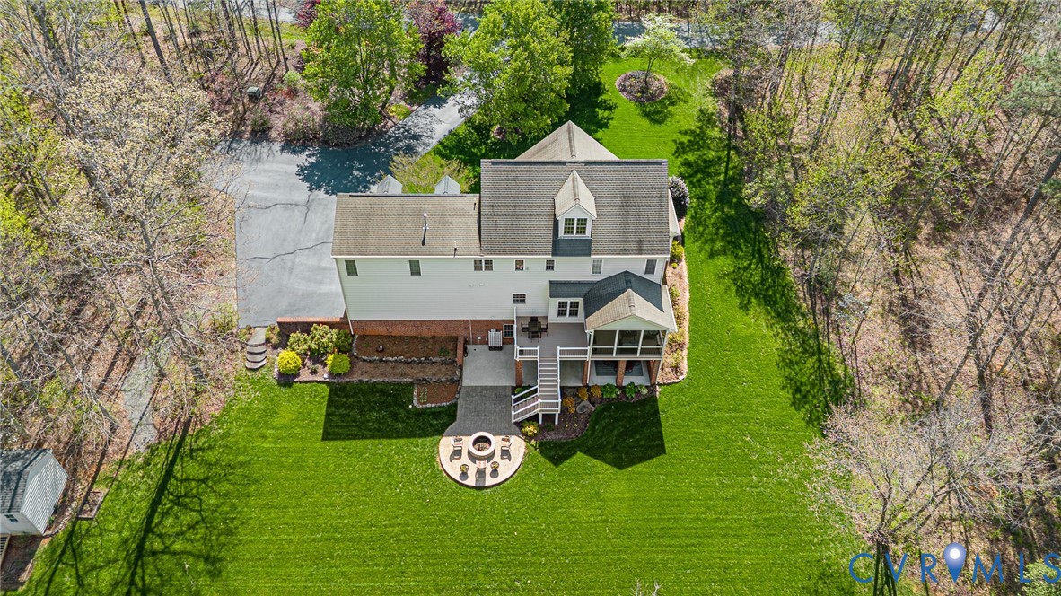 14436 Overlook Ridge Lane Beaverdam, VA 23015 - Photo 81 of 82 a view of a house with a big yard potted plants and large tree