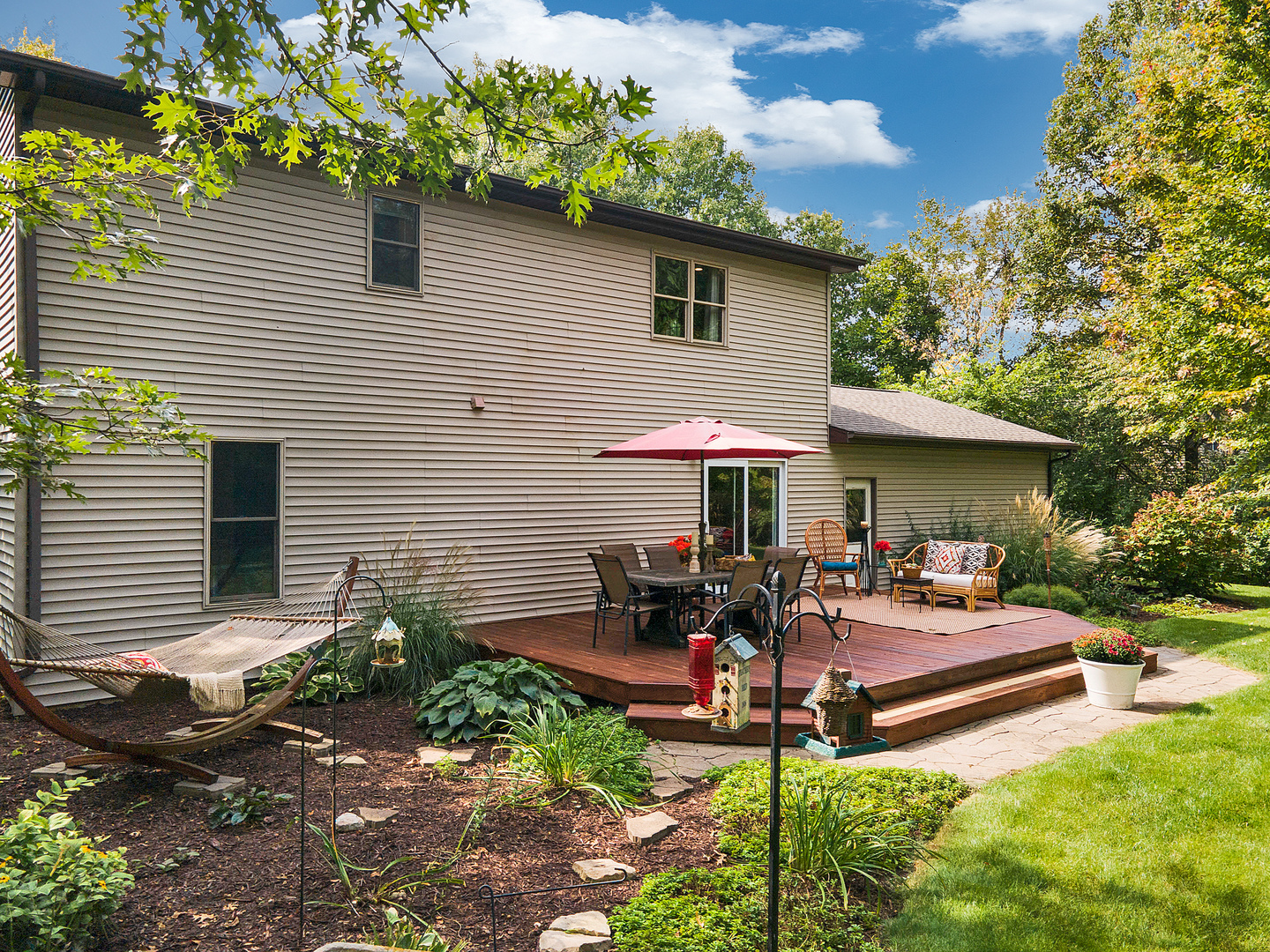 804 Kickapoo Drive Danvers, IL 61732 - Photo 2 of 33 a view of a house with backyard and sitting area