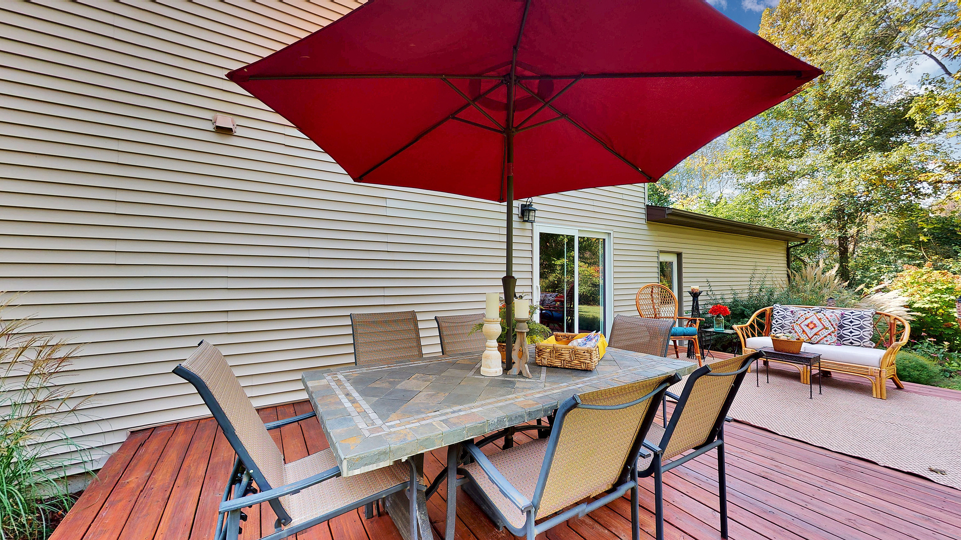 804 Kickapoo Drive Danvers, IL 61732 - Photo 13 of 33 a view of a patio with a table and chairs under an umbrella