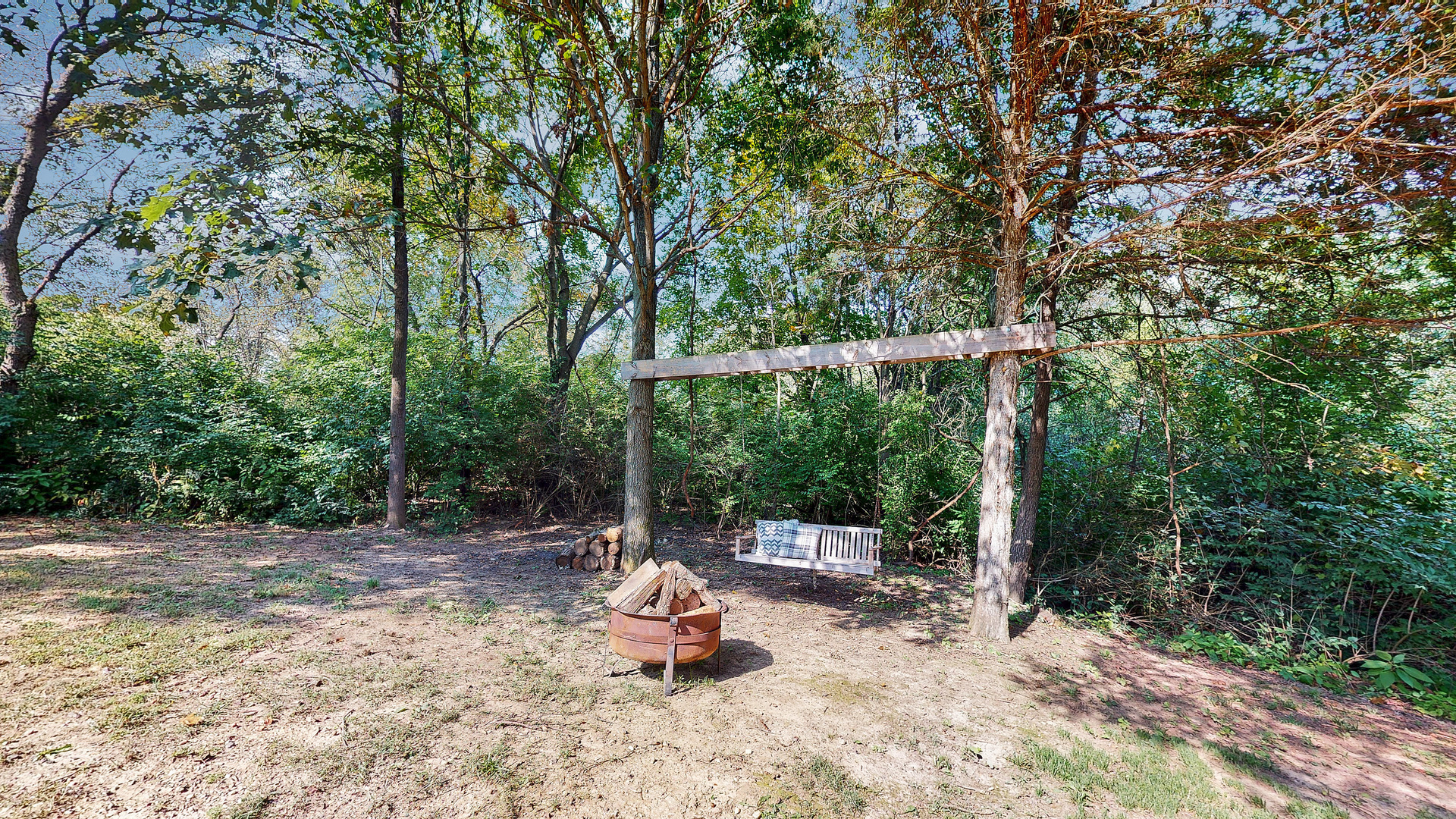 804 Kickapoo Drive Danvers, IL 61732 - Photo 16 of 33 a backyard of a house with table and chairs