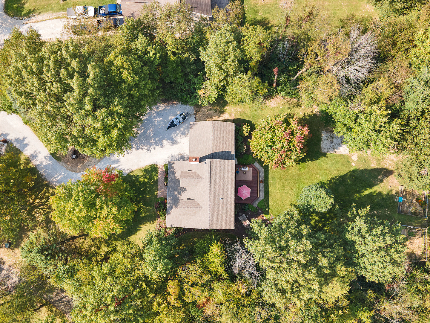 804 Kickapoo Drive Danvers, IL 61732 - Photo 18 of 33 an aerial view of a house with a yard and large trees