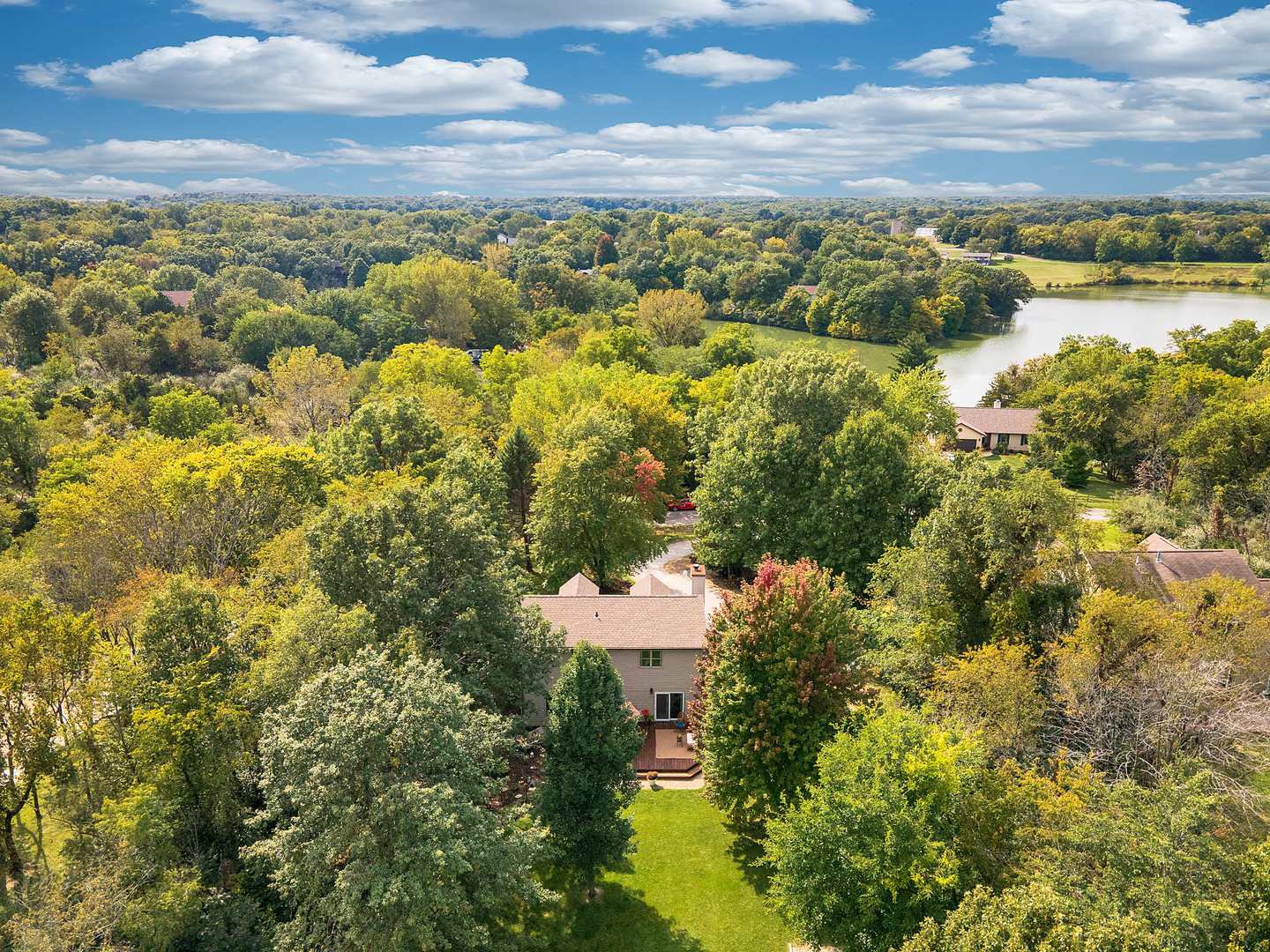 804 Kickapoo Drive Danvers, IL 61732 - Photo 3 of 33 a view of a lake with houses in the back